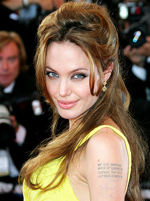 The Japanese symbol for “death” has been tattooed on Angelina's shoulder.